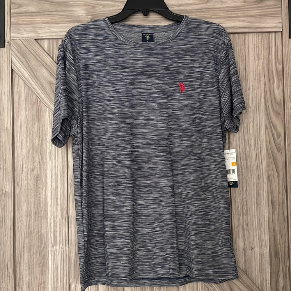 Polo tshirt stretch breathable very comfy material.  Size small navy blue & grey